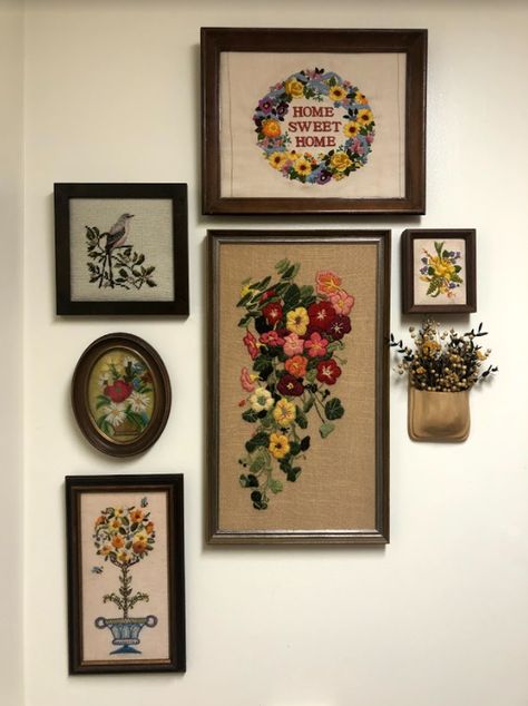 Framed Cross Stitch How To Display, Cross Stitch Display Ideas Wall Art, Stitched Wall Art, Embroidery Wall Art Frames, Wildflower Gallery Wall, Framed Embroidery Wall Art Living Room, Cross Stitch Wall Display, Crewel Gallery Wall, Cross Stitch Gallery Wall