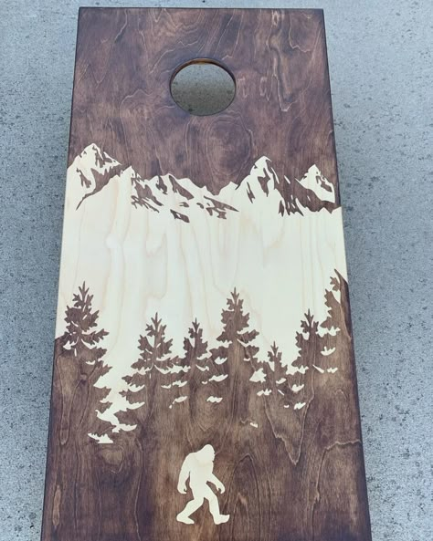 Sasquatch Cornhole Boards | General Finishes Design Center Cricut Cornhole Boards Diy, Wood Burned Cornhole Boards, Bag Boards Designs, Cornhole Board, Cornhole Board Ideas, Camping Cornhole Boards, Cornhole Design Ideas, Cool Cornhole Designs, Cool Corn Hole Boards Designs