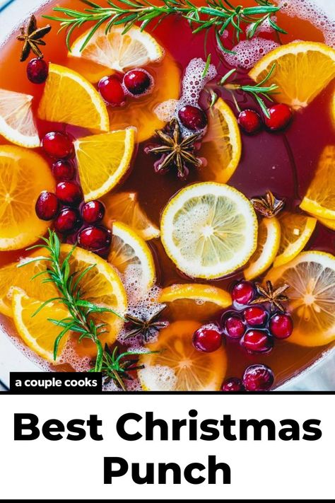 his delicious Christmas Punch recipe is fruity and delicious! Make it with rum for a punch with alcohol, or omit for non alcoholic. #christmas #christmaspunch #punch #nonalcoholicpunch #alcoholicpunch Non Alcoholic Christmas Punch, Homemade Rootbeer, Classic Eggnog, Orange Punch, Non Alcoholic Punch, A Couple Cooks, Alcoholic Punch, Cranberry Juice Cocktail, Christmas Punch Recipes