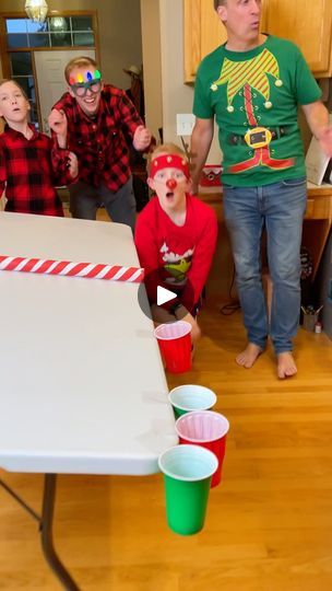 690K views · 1.1K comments | The Christmas Tilted Table Game 🎄 | The Christmas Tilted Table Game 🎄

Family plays fun Christmas party game by rolling ping pong balls on a tilted table into red and green cups for funny... | By Benson Crew | Alright, roll the ball. Oh, you
got this one. Which means you get a red balloon. Here. Oh.
What did you get? Oh, hot. Hot chocolate with $10. Your turn,
Kezzy. Hey, Judge. Oh, you got this one which means you get a
green one. Right there? What is it? Oh, you got a bunch of
those. Is there anything else? Oh. Oh. Oh, mommy. $20. $20.
It's your turn, and by the way guys if you get it into the
gold cup you get the special prize you get the gold balloon
which is a special prize so the gold cup gets a special prize
get the gold get the gold you got this one w Christmas Pong Game, Christmas Ping Pong Ball Games, Ping Pong Christmas Game, Ping Pong Ball Games, Fun Family Christmas Games, Christmas Gift Games, Tilt Table, Pong Game, Fun Christmas Party Games