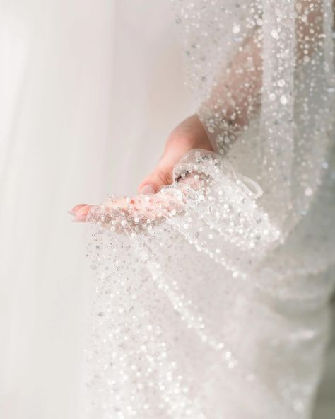 ✨ Add a touch of sparkle and sophistication to your bridal look with our French Sequin, Pearl, and Beaded Single Tier Wedding Veil. This floor-length veil, adorned with delicate beads, pearls, and sequins, offers the perfect blend of elegance and glamour. With its luxurious off-white hue and U-cut design, it’s the perfect complement to any wedding gown. Walk down the aisle in style with this stunning statement piece! 👰💕 Discover more and shop now at tessakim.com! 💍 #WeddingVeil #BridalAcces... Beaded Bridal Veil, Sparkle Veil, Embellished Veil, Floor Length Veil, Beaded Veils, Drop Veil, Veil Styles, Luxury Brides, Walk Down The Aisle