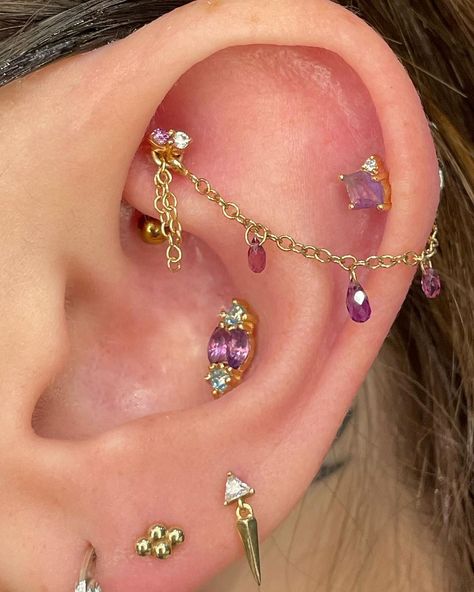 Diamond Heart Studios | ✨Ear Curation✨ This client wanted a new set of jewelry for Spring/Summer featuring purple tones so we chose amethyst and rhodolite with… | Instagram Ear Ideas, Ear Curation, Set Of Jewelry, Pretty Ear Piercings, Buddha Jewelry, Purple Tones, Conch Piercing, Sky Blue Topaz, Helix Piercing