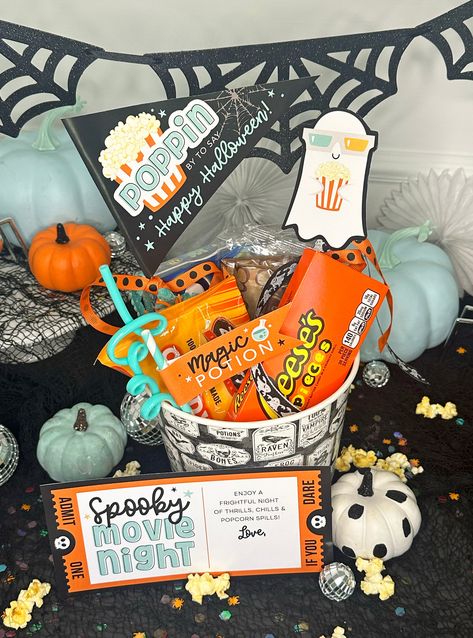 This adorable printable Halloween set is a perfect addition to your spooky movie night gift baskets! Plan a Halloween movie night for your kids or gift to friends and neighbors. Prints on standard 8.5 x 11 inch page. Print as many as you need! Nothing physical will be shipped. Set includes:Spooky Movie Night Card"Poppin by to say Happy Halloween" pennant flag"Magic Potion" straw flagSmall TicketGhost with Popcorn This design is also available in pink: https://pixeldustdesigns.com/products/spooky-movie-night-halloween-movie-night-gift-basket-printables Directions:1. You will receive a pdf download link once payment is complete.2. Easily add a name to card using Adobe Acrobat Reader or simply handwrite name after printing.3. Print on standard 8.5 x 11 inch card stock4. Cut out, fold around w Kids Spooky Basket, Movie Night Basket Ideas, Cute Spooky Basket Ideas For Friends, Halloween Gift Baskets For Kids, Spooky Basket For Him, Boo Basket Ideas For Best Friend, Soda Cakes, Spooky Movie Night, Movie Basket