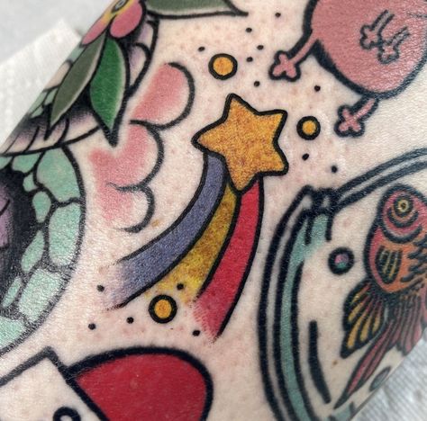 Rainbow Tattoo Traditional, 80s Themed Tattoos, American Traditional Rainbow Tattoo, Tattoo Star Filler, Cute Gap Filler Tattoos, Tiny Traditional Tattoo Filler, 1980s Tattoos, Bubblegum Traditional Tattoo, Tiny Gap Filler Tattoo