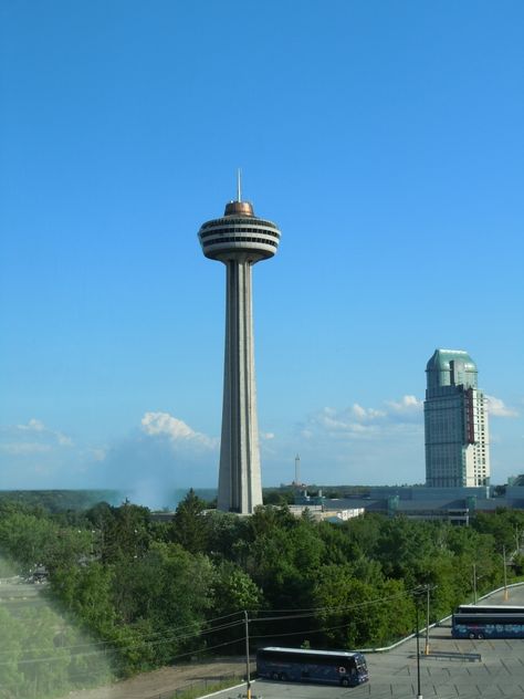 The 520' (158 m) Skylon Tower.  High atop of it all - you can dine in the tower's revolving restaurant - while you view THE FALLS! - Niagara Falls, Canada. Skylon Tower, Revolving Restaurant, Niagara Falls Canada, Dine In, Space Needle, All You Can, Cn Tower, Niagara Falls, Lamp Post