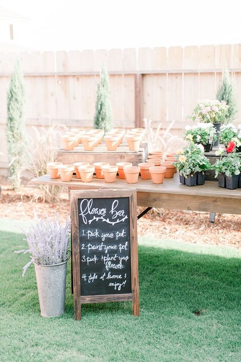 It's no surprise that when I was trying to think of a theme/style for Ellery's first birthday party the first thing that came to mind was flowersflowersand more flowersobviously this poor girl has had no choice but to love flowers since she was bornpeep her nursery hereI came across the c u t e s t flower cart that was a new business in townpopping up at local hangs and farmers markets selling their blooms and I just knew no matter what we needed that cart at ellery's partyI pictured that littl Home Garden Party Ideas, Planting Birthday Party, Plant Your Own Flower Party, Garden Party Gift Bag Ideas, Garden Theme 2nd Birthday Party, Potting Bar Party, Flower Garden First Birthday, Paint And Plant Party, Flower Stand Birthday Party