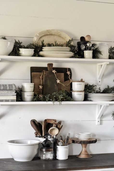 The theme for my Christmas shelves this year was simple and minimal. I chose to use faux cypress greenery garlands and a small vintage style bell garland to create a simple farmhouse Christmas holiday shelf style.  #rockyhedgefarm #simplechristmas #farmhousechristmas #rusticchristmas Christmas Shelves, Shabby Chic Christmas Decorations, Bell Garland, Winter Farmhouse, Chic Christmas Decor, Simple Farmhouse, Season Decor, Farmhouse Decorating, Farmhouse Inspiration