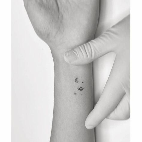 Minimalistic style Saturn, moon and stars tattoo Astronomy Tattoos, Moon And Stars Tattoo, Playground Tattoo, Astronomy Tattoo, Maching Tattoos, Saturn Tattoo, Small Moon Tattoos, Stars Tattoo, Taylor Swift Tattoo