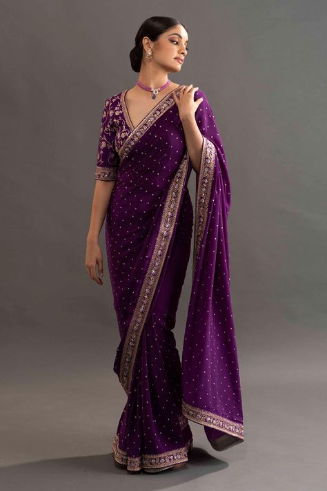 Violet crepe saree with all over buttis and zari embroidered border. Comes with embroidered blouse. Component: 2 Pattern: Embroidered Type Of Work: Floral Neckline: V neck Sleeve Type: Elbow length Fabric: Crepe Color: Purple Other Details: Zari embroidered border Occasion: Reception,Wedding - Aza Fashions Kavitha Gutta, डिजाइनर कपड़े, Purple Saree, Fancy Sarees Party Wear, Crepe Saree, Indian Saree Blouses Designs, Saree Blouse Patterns, Indian Fashion Saree, Saree Designs Party Wear