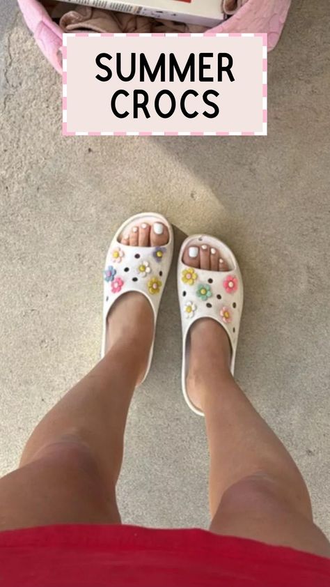 These summer croc sandals are SO comfortable and my favorite lake sandal or pool day sandal!  What's cuter than white crocs with colorful flowers?!  They're the perfect addition to any crocs outfit for summer - get them here! Croc Sandals, Crocs Outfit, White Crocs, Outfit For Summer, Pool Day, Pool Days, Brunch Outfit, Fun Summer, Jeans Shorts