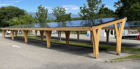 Timber framed solar carport Solar Carport, Carport Kits, Vertical Integration, Renewable Energy Systems, Ground Covering, Car Port, Larch Wood, Solar Car, Offshore Wind