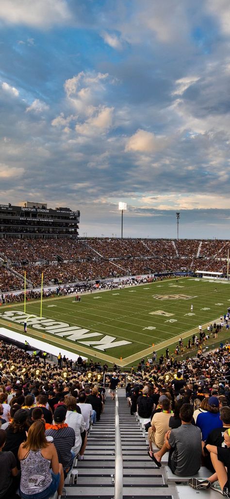 Charge on and show your UCF school spirit by saving this football stadium mobile wallpaper!📱⚡️💛 #UCFSocial #UCFWallpaperAesthetic House Phone Wallpaper, Ucf Football, House Phone, Florida Football, College Vision Board, College Tailgating, Best Colleges, Colleges In Florida, College Motivation