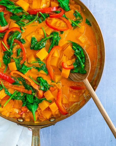 This butternut squash curry is an easy plant based dinner that's vibrant and full-flavored, starring Thai red curry paste and coconut milk. #butternutsquashcurry #butternutsquash #squashcurry #curryrecipe #thaicurry #thaisquashcurry Butternut Squash Lasagna Recipe, Sweet Potato Chickpea Curry, Thai Red Curry Paste, Squash Curry, Butternut Squash Curry, Butternut Squash Lasagna, Curried Butternut Squash Soup, A Couple Cooks, Cut Butternut Squash