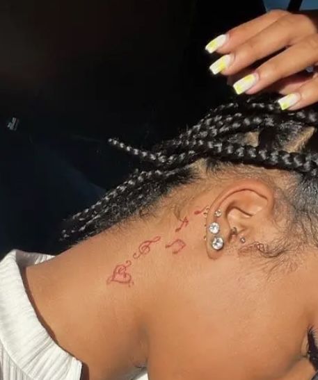 Music Tattoos Black Women, Taurus Tattoo Behind Ear, Blessed Tattoo On Neck, Tattoo Inside Ear, Small Tattoos Dance, Partynextdoor Tattoo Ideas, Cute Small Neck Tattoos For Women, Small Tattoos For Black Skin, 4 Inch Tattoo