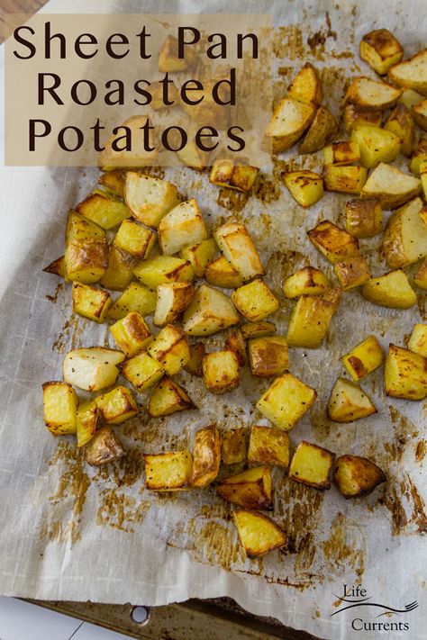 Sheet Pan Roasted Potatoes on parchment paper on a sheet pan with the title Sheet Pan Roasted Potatoes, Oven Casserole Recipes, Pan Roasted Potatoes, Food Rocks, Easy Roasted Potatoes, Cooked Potatoes, Potatoes In Oven, Roasted Potato Recipes, Cubed Potatoes