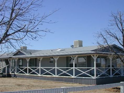 Double Wide with Wrap Around Porch. Ha! Ha! Just kidding! My idea ... Silver City New Mexico, Single Wide Remodel, Garden State Plaza, Porch Kits, Mobile Home Renovations, Manufactured Home Remodel, Building A Porch, Mobile Home Decorating, Mobile Home Living