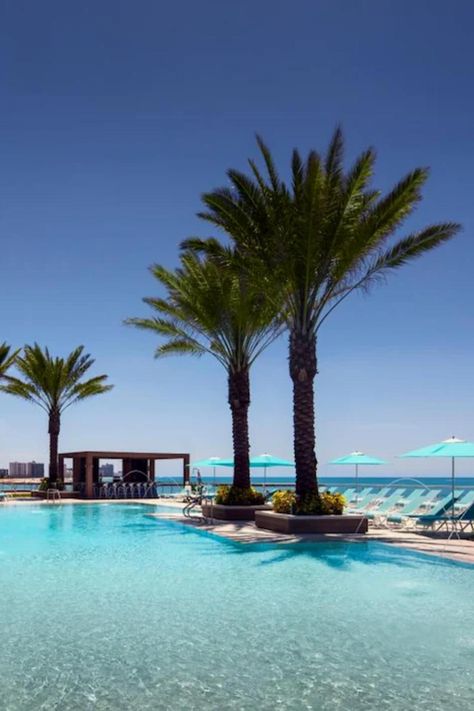 When you're looking for a romantic resort in Florida, the list of possibilities may seem daunting. That's why we've compared all of the most popular Florida resorts to find the ones with the most luxurious amenities and stunning views. Whether you're looking for an intimate beachfront hotel or a sprawling resort in Orlando, you're sure to find the perfect place to stay on your romantic Florida getaway. #florida #floridaresorts #floridahotels #beachresorts #orlandoresorts Romantic Florida Getaway, Resorts In Florida, Florida Beach Resorts, Spa Retreats, Kid Friendly Resorts, Florida Getaway, Romantic Resorts, Family Vacation Planning, Southern Travel