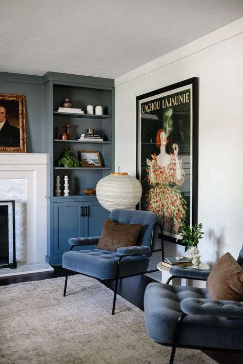 Whether it's a blue living room, bedroom, or kitchen you're looking at, De Nimes by Farrow & Ball is a great choice - it's a lovely tone that is the mid-point between blue and grey. The color isn't a typical deep blue that can sometimes overwhelm. This tone is the right balance between light and dark

Image credit: Yond Interiors Heritage Paint Colours, Farrow And Ball Living Room, Farrow And Ball Paint, Dining Room Wall Art, Blue Paint Colors, Grey Paint Colors, Farrow And Ball, Stylish Living Room, Blue Living Room