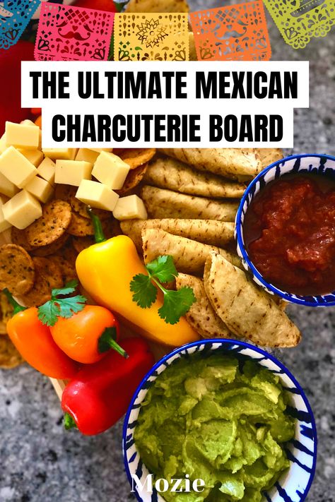 This post is all about a mexican charcuterie board+how you can make a mexican charcuterie board. This is a perfect spread for Cinco de Mayo. Are you looking for something for a house party or get together? This will please friends and family. It's the perfect appetizer to server when friends come over. Spicy mexican charcuterie board & sweet cinnamon graham crackers. We include even more mexican charcuterie board ideas here! Check our blog to read how you can make your own mexican charcuterie. Mexican Food Themed Charcuterie Board, Taquito Charcuterie Board, Mexican Taco Charcuterie Board, Mexican Bingo Party Ideas, Cinco De Mayo Charcuterie Board Ideas, Mexican Appetizer Board, Mexican Chacutery Board Ideas, Charcuterie Mexican Board Ideas, Guacamole Charcuterie Board