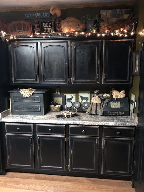 Black cabinets  Primitive style Primitive Kitchen Cabinets, Witchy Kitchen, Primitive Bathrooms, Primitive Homes, Black Cabinet, Black Kitchen Cabinets, Kitchen Cabinets Decor, Kitchen Cabinet Styles, Primitive Kitchen