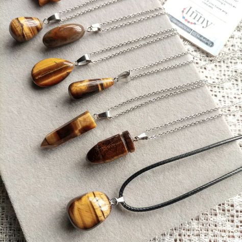 Spreading Joy through Tiger's Eye 🤎 Style: Unisex Necklace length: 45+5cm extender Pendant + Necklace/ Black cord 🛍️₦‎4,000 - ₦‎10,000 each 🔌 Shop via DM. 🔌 Click the link in bio to chat on WhatsApp. 🔌 Payment validates your order 🔌Shop matching Gemstone Bracelet 🔌 Doorstep shipping Worldwide from Lagos, Nigeria 🌍 #Beadsbyinny #gemstoneinlagos #giftsforfriends. #browncrystal #gemstonejewelry #crystals #tigereye Lagos Nigeria, Unisex Necklace, Necklace Black, Tiger's Eye, Necklace Length, Gemstone Bracelet, Tiger Eye, Click The Link, Gemstone Jewelry