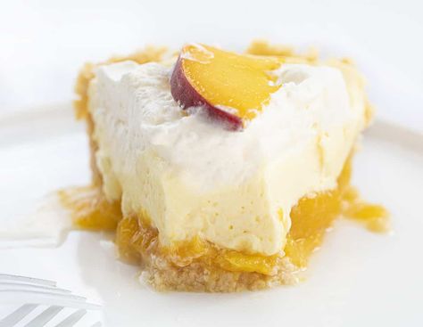 Peaches and Cream Pie is a no-bake dessert that is made with a shortbread cookie crust, sweet peach filling, a cream cheese layer, and topped with a homemade whipped topping! Pie, Peach Pie, Peach Cream Pie, No Bake Pie, Cream Pie, Recipes, Dessert, Summer Dessert, BBQ, Creamy Pie, Peach Cream Pie Recipe, i am baker, iambaker, Peaches and Cream Pie Peaches And Cream Pie, Pie Peach, Peach Filling, Cream Filling Recipe, Shortbread Cookie Crust, Peach Dessert, Creamy Pie, Dessert Summer, I Am Baker