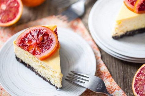 Blood Orange Cheesecake: the candied orange slices are so pretty and the citrus flavor works so well against the creamy cheesecake! The crunchy chocolate cookie crust is the perfect compliment. Chocolate Cookie Crust, Easy Sangria Recipes, Almond Biscotti Recipe, Orange Cheesecake, Candied Orange Slices, Homemade Chocolate Truffles, Pumpkin Rolls Recipe, Greek Yogurt Pancakes, Oatmeal Cranberry Cookies