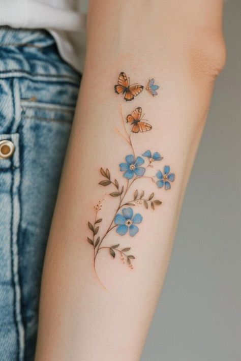 The Beauty and Significance of the Forget Me Not Flower Tattoo Petite Flower Tattoo, Don't Forget Me Flower Tattoo, Forget Me Not Tattoo Memorial, Color Tattoo Flower, Forget Me Nots And Butterfly Tattoo, Tiny Forget Me Not Tattoo, Fine Line Forget Me Not Tattoo, Forget Me Not Tattoos, Blue Flowers Tattoo