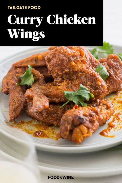 These quick and easy 45-minute curry chicken wing recipe incorporates onions, garlic, curry, tomato sauce, soy sauce and cilantro to create the ultimate tailgate food. Whether you’re looking to eat these chicken wings alongside a pizza at a tailgate party or as a gameday snack, it’s a great choice for a chicken wing recipe.#curryrecipes #chickenwings #chickenwingrecipes #appetizerrecipes #tailgatefood #tailgatesnacks Curry Wings, Recipe For Chicken Wings, Curry Chicken Wings, Homemade Curry Sauce, Garlic Curry, Chicken Wing Recipe, Tailgate Snacks, Wing Recipe, Homemade Curry