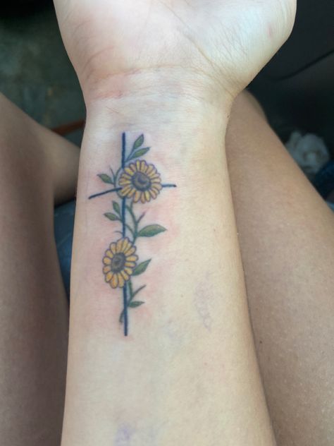 Meaningful Sunflower Tattoos For Women, Small Sunflower Hand Tattoo, Christian Sunflower Tattoo, Faith Sunflower Tattoo, Cross And Sunflower Tattoos For Women, Meaningful Sunflower Tattoo, Cross And Sunflower Tattoo, Sunflower Tattoo For Lost Loved One, Sophisticated Tattoos For Women