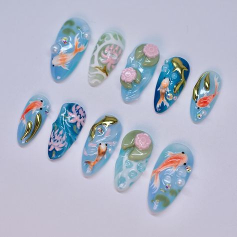 Koi fish pond ~Tier 3 custom~ Hand sculpted lily pads, hand painted koi fish & flowers, isolated chrome. Fish Acrylic Nails, Koi Nail Art, Water Lily Nails, Koi Pond Nails, Austin Nails, Koi Fish Nail Art, Hibiscus Flower Nail Art, Koi Nails, Koi Fish Nails