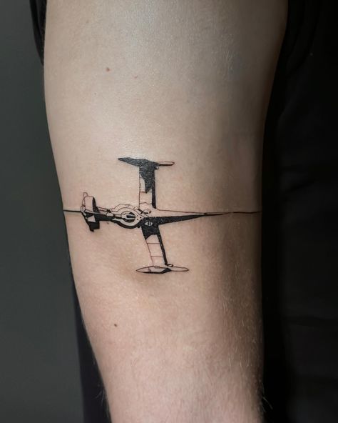 where the cowboy bebop fans at . spike’s ship with a (my first😨😮‍💨) band around the arm for rob’s first tattoo — i am so grateful thank you rob 🌟😭 . we stenciled the ship and freehanded the band. i have heard from other tattooers that straight lines on the body are an optical illusion since your body is only made of curves. i took my time and looked at it from afar about 800 times during the process and i’m pretty happy with the result 🤞🏼 rob is the mvp for patience and being down for the lea... Bebop Ship, See You Space Cowboy Tattoo, Bebop And Rocksteady Tattoo, You're Gonna Carry That Weight Cowboy Bebop Tattoo, Cowboy Bebop Ship, Youre Gonna Carry That Weight Cowboy Bebop, Cowboy Bebop Silhouette, Cowboy Bebop Black And White, Spaceship Tattoo