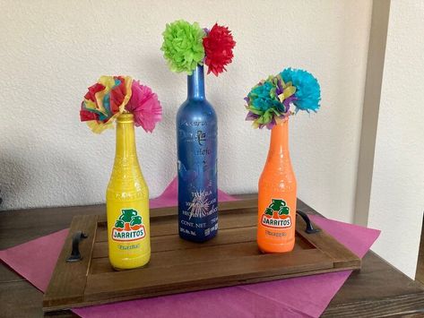 Had to call the family for a last minute Cinco de Mayo celebration party! Figured out the easiest and cheapest way to make a centerpiece was to use whatever I had available on hand. You can also use this centerpiece for a Mexican-theme party, which are very popular here in the Southwest! Mexican Party Table Centerpieces, Fiesta Theme Centerpieces Diy, Modelo Centerpieces Birthday Parties, Mexican Jarritos Centerpieces, Diy Cantaritos Centerpieces, Fiesta Centerpieces Diy, Cinco De Mayo Centerpiece Ideas, Fiesta Theme Centerpieces, Mexican Party Centerpiece Ideas