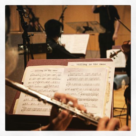 Flutist playing during recording session of "Killing in the Name," the orchestral arrangement Flutist Aesthetic, Someone Playing Flute Reference, Flute Astethic, Flute Playing Aesthetic, Vision Board Assignment, Musician Aesthetic, Playing Flute, Music Student, Fall 24