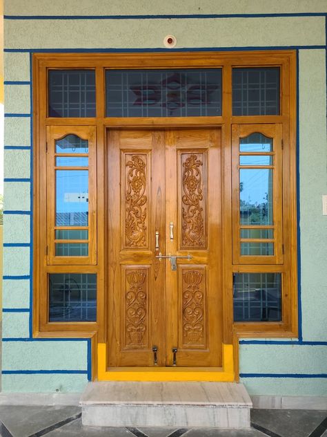 Latest teak wood main door designs 2022 Teak Doors Design, Latest Main Double Door Design Entrance, Teak Wood Window Design, Teak Wood Main Double Door Design Entrance Modern Interior, Main Door Design Photos Latest, Main Door With Window Design, Teak Wood Main Door Design Entrance Indian Double Door, Window Door Design Wooden, Main Door Arch Design