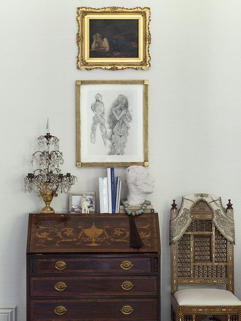 Ornate wooden hutch and chair agaist cream colored wall with framed wall art. Secretary Desk Decor Ideas, Secretary Desk Decor, Antique And Modern Mix Decor, Desk Decor Ideas, Vintage Secretary Desk, Eclectic Glam, Antique Secretary Desks, Desk Nook, Antique Desks