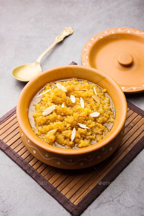 Moong Dal Halwa or Mung Daal Halva is an Indian sweet /dessert recipe, garnished with dry fruits by stockimagefactory. Moong dal halwa is a classic Indian sweet dish made with moong lentils, sugar, ghee and cardamom powder #Sponsored #dessert, #sweet, #Indian, #dry Moong Daal Halwa, Mung Dal Halwa, Moong Dal Halwa, Veg Food, Sweet Dish, Moong Dal, Sweet Recipes Desserts, Cardamom Powder, Indian Sweet