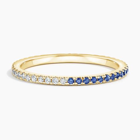 Ballad Sapphire and Diamond Eternity Wedding Ring - 18K Yellow Gold. This petite ring features scalloped pavé sapphires one half of the way around the band that meets shimmering round white diamonds elegantly completing the second half of this chic band (1/6 total carat weight). Eternity Ring Diamond Gold, Minimalist Rings Simple, Chic Band, Eternity Wedding Ring, Bling Ring, Petite Ring, Sapphire Wedding Band, Diamond Eternity Ring, Full Eternity Ring