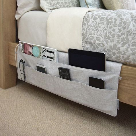 A bedside caddy that’ll never leave you without the remote or your reading glasses. | 21 Things That Will Make Your Bedroom Even Cozier Bedside Pocket, Dorms Decor, Design Ložnic, Dorm Room Organization, College Dorm Rooms, Decor Minimalist, Organization Bedroom, Dorm Room Decor, Room Organization