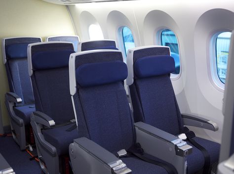 This New Plane Has No Middle Seats — and That’s Not Even the Coolest Part | Airplane Interior, Plane Seats, Airplane Seats, Technical Textiles, Couple Sleeping, Aircraft Interiors, Airline Travel, Air Travel, Modern Technology