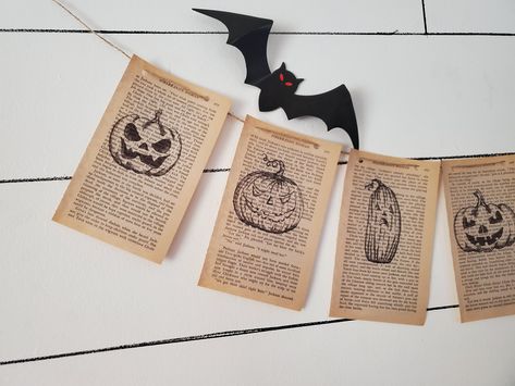 "Add simple and easy decor to your space with this Handmade \". Jack-O-Lantern Print\" Banner. Perfect Halloween or Fall themed decoration. Hang throughout the entire fall season or add to your ghoulish collection. 4 Banner lengths available Banners are printed on standard 4x6 book pages with an extra 10 inches of twine on each end. Jack-O-Lanterns are printed onto the recycled book pages, then adorned with twine to give this unique vintage feel. Room to cut your own flag tales if desired, unles Gothic Halloween Decor, Moth Print, Easy Decor, Recycled Book, Book Page Crafts, Jack O'lantern, Halloween Garland, Display Banners, Fall Garland