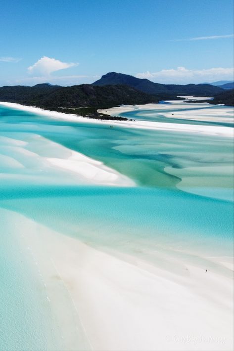 Whitehaven Beach in the Whitsundays Australia is iconic for it's swirling white sands and blue and green waters. It looks like a watercolor painting and should be on your bucket list. White Heaven Beach Australia, White Haven Beach Australia, Whitsundays Australia Aesthetic, Whit Sundays Australia, Whitsundays Aesthetic, Australia Beach Aesthetic, Australia Whitsundays, Beach Bucket List, Whitehaven Beach Australia