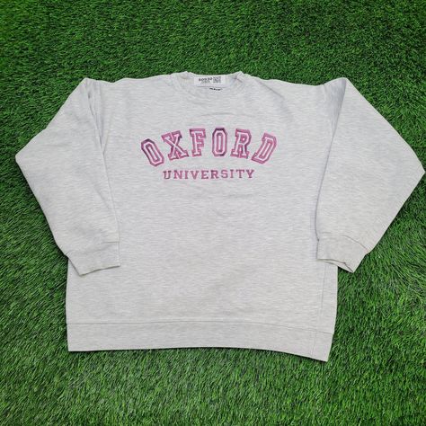 Vintage Oxford University Sweatshirt Womens Large 23x23 Crop Show off your style with this vintage Oxford University cropped sweatshirt. Embroidered logo, Y2K vibes, perfect for retro fans!  * Used condition  * Length is on the shorter side  * No rips/holes  * Stains (see picture and zoom in to see size/location)  * Normal fading from washing VINTAGE SWEATSHIRT, OXFORD UNIVERSITY SWEATSHIRT, Y2K FASHION, CROPPED SWEATSHIRT, EMBROIDERED LOGO, WOMEN'S LARGE, UNIVERSITY APPAREL, RETRO STYLE, COLLECTIBLE COLLEGE GEAR, VINTAGE Y2K SWEATSHIRT 80930 Logo Y2k, University Apparel, Y2k Sweatshirt, College Gear, Sweatshirt Y2k, Retro Fan, University Sweatshirts, Y2k Vibes, Oxford University