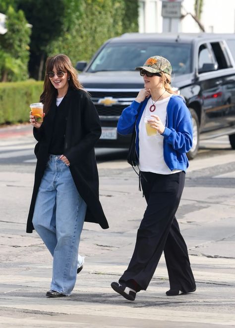 Dakota Johnson and J.Law Showed Off a Simple Styling Trick in L.A. | Who What Wear UK Dakota Johnson Street Style, Dakota Johnson Style, J Law, Celebrity Style Icons, Paparazzi Photos, White T Shirts, Elevated Basics, Hollywood Fashion, Denim Style