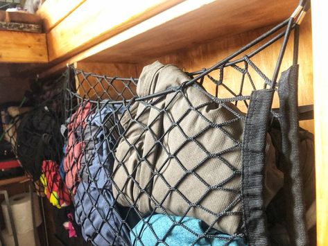 Vanlife Shoe Storage, Van Life Clothes Storage, Vanlife Clothes Storage, Van Life Hammock, Van Storage Ideas Organizing, Camper Van Clothes Storage, Van Shelving Ideas, Caravelle Conversion, Van Renovation