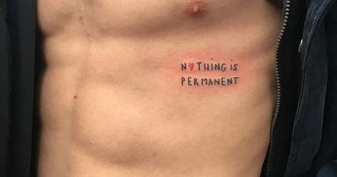 Be Positive Tattoo, Oblique Tattoos For Guys, Nothing Is Permanent Tattoo, One Word Tattoos For Men, Word Tattoos For Men, Wording Tattoo, Tattoo Homme, Small Rib Tattoos, Rib Tattoos For Guys