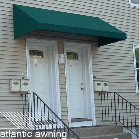 Here is a residential door hood awning that gives coverage to an entry way. Cafe Awning, Awning Design, Canvas Awnings, Small Tent, Vertical Garden Diy, Door Awnings, Tudor Style Homes, Window Awnings, Residential Doors