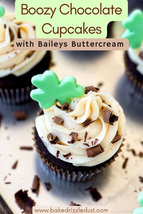 top view of chocolate cupcakes frosted with a swirl of baileys buttercream decorated with chocolate curls and a green chocolate clover Clover Cupcakes, Bakery Cake Ideas, St Patricks Day Dessert, Boozy Cupcakes Recipes, St Patricks Day Treats, Baileys Buttercream, Baileys Cupcakes, Baileys Cake, Boozy Chocolate