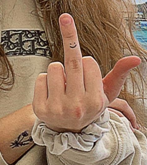 Smiley Face On Finger Tattoo, Small Tattoos Smiley Face, Tattoos On Middle Finger, Smiley Finger Tattoo, Middle Finger Pics, Smiley Face Finger Tattoo, 13 On Hand, Aesthetic Middle Finger, Smile Face Tattoo