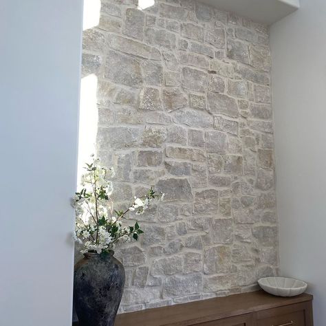 Beehive Brick and Stone | Our beautiful Bonneville natural stone was used throughout the exterior and interior of this home | Instagram Heavy Mortar Stone Exterior, Entryway Stone Walls, Exposed Stone Interior, Limewash Stone Interior, Plastered Brick Wall, Stone Foyer Wall Entryway, Whitewashed Stone Exterior, Internal Stone Wall, House Exterior Stone Accent